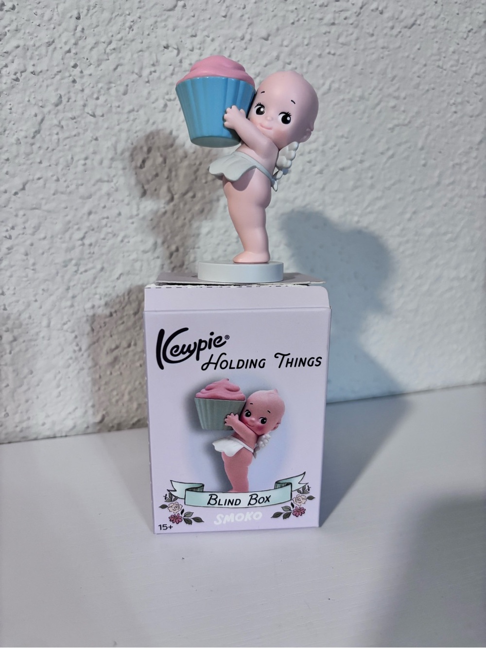 Kewpie holding Cupcake Figurine - Holding Things Collectible